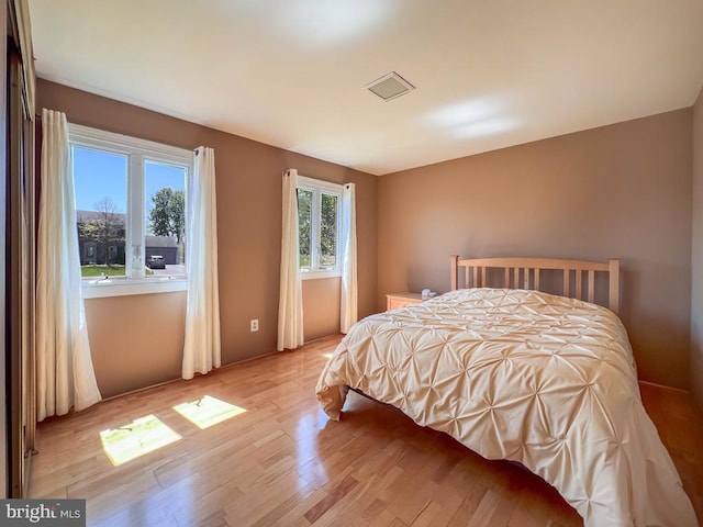 bedroom with light wood-style flooring