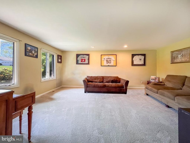 living area featuring carpet floors, recessed lighting, and baseboards