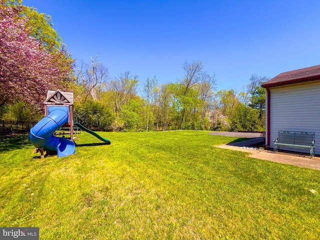 view of yard featuring a playground