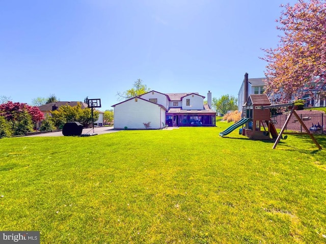 view of yard with a playground