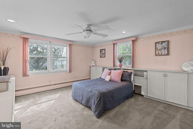 bedroom featuring crown molding, ceiling fan, recessed lighting, a baseboard heating unit, and carpet flooring