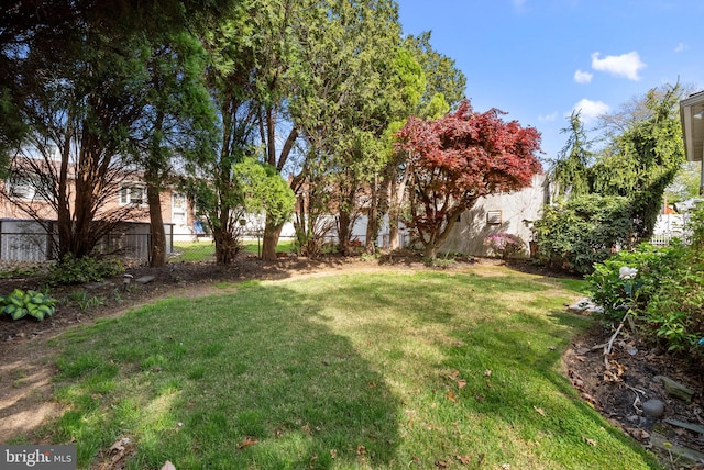 view of yard with fence