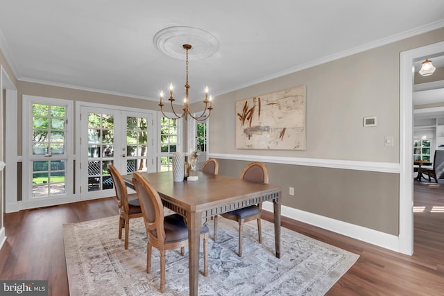 302 Maple Ln, Severna Park, MD 21146 - dining room featuring a chandelier, french doors, wood finished floors, crown molding, and baseboards