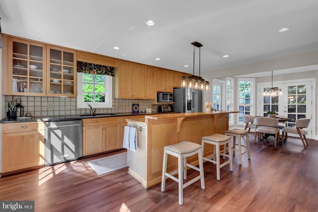 302 Maple Ln, Severna Park, MD 21146 - kitchen featuring appliances with stainless steel finishes, a sink, a chandelier, dark wood-type flooring, and recessed lighting