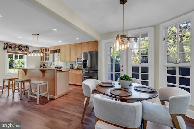 302 Maple Ln, Severna Park, MD 21146 - dining area with a chandelier, wood finished floors, recessed lighting, and baseboards