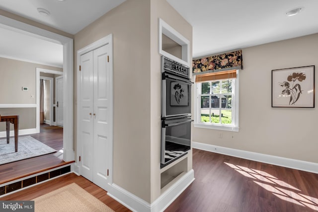 302 Maple Ln, Severna Park, MD 21146 - hallway featuring wood finished floors and baseboards