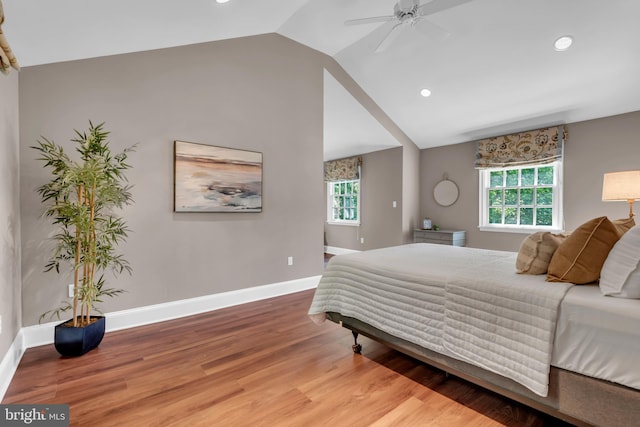 302 Maple Ln, Severna Park, MD 21146 - bedroom featuring lofted ceiling, multiple windows, wood finished floors, recessed lighting, and baseboards