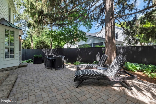 302 Maple Ln, Severna Park, MD 21146 - fenced backyard featuring a patio area and outdoor dining area