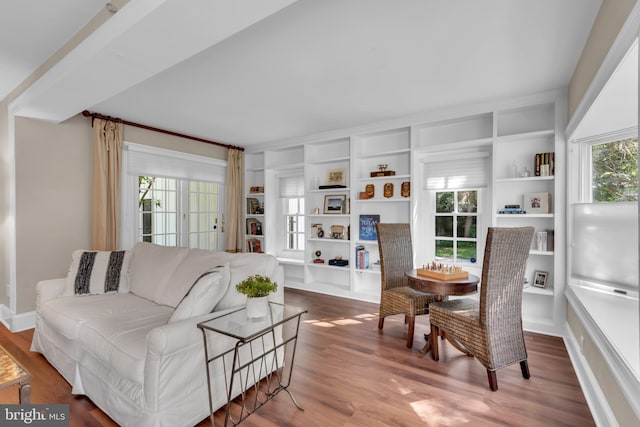 302 Maple Ln, Severna Park, MD 21146 - living area featuring wood finished floors, plenty of natural light, and built in shelves