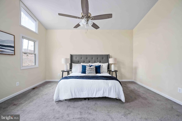 bedroom featuring baseboards, a ceiling fan, carpet flooring, and lofted ceiling
