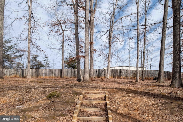 view of yard featuring fence