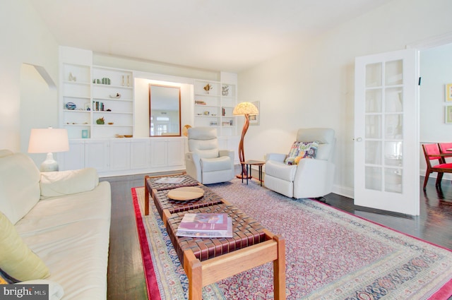 living room with french doors and wood finished floors