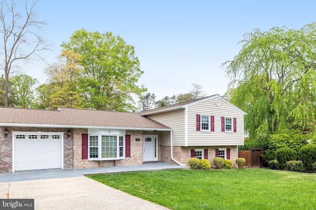 8610 Westmeath Ct, Springfield, VA 22152 - split level home featuring fence, brick siding, a garage, a front yard, and driveway