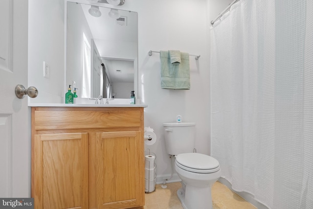 bathroom with visible vents, vanity, tile patterned floors, toilet, and a shower with shower curtain
