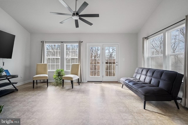 sitting room featuring ceiling fan and plenty of natural light