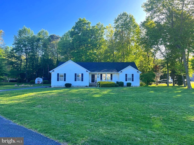 view of front of home with a front yard