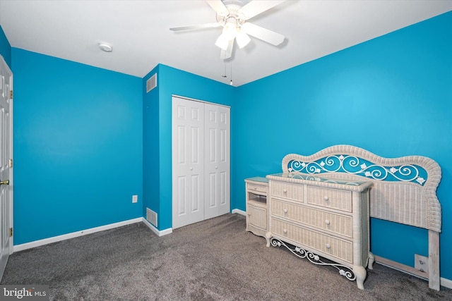 bedroom featuring a ceiling fan, visible vents, baseboards, a closet, and carpet