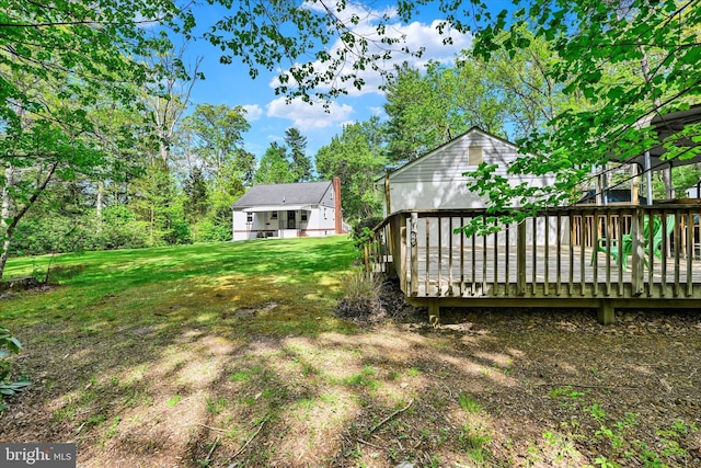 view of yard with a deck