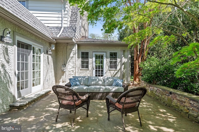 view of patio featuring an outdoor hangout area and french doors