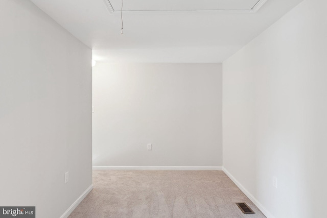 4411 Pembrook Village Dr Unit 101, Alexandria, VA 22309 - carpeted spare room featuring baseboards, attic access, and visible vents