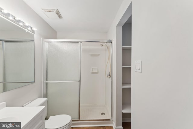 4411 Pembrook Village Dr Unit 101, Alexandria, VA 22309 - full bathroom with vanity, a stall shower, toilet, and visible vents