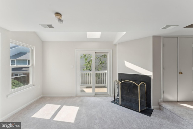 4411 Pembrook Village Dr Unit 101, Alexandria, VA 22309 - unfurnished living room featuring a fireplace with flush hearth, carpet floors, baseboards, and visible vents