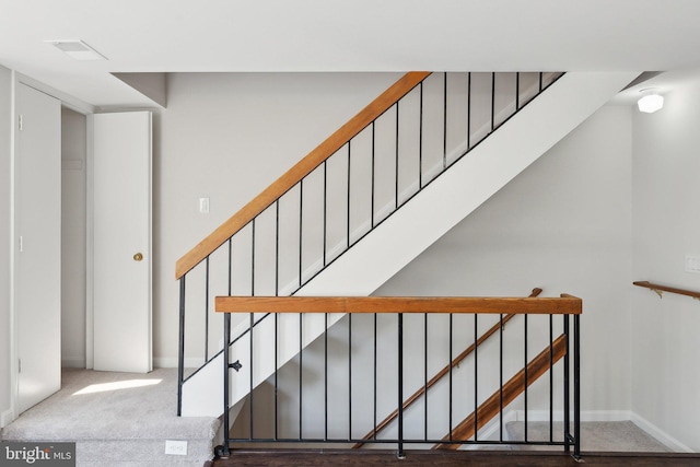 4411 Pembrook Village Dr Unit 101, Alexandria, VA 22309 - stairway featuring baseboards, visible vents, and carpet