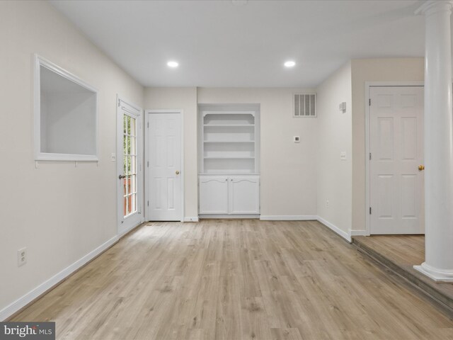 109 Donelson Loop, Stafford, VA 22554 - unfurnished room featuring decorative columns, baseboards, light wood-type flooring, built in shelves, and recessed lighting