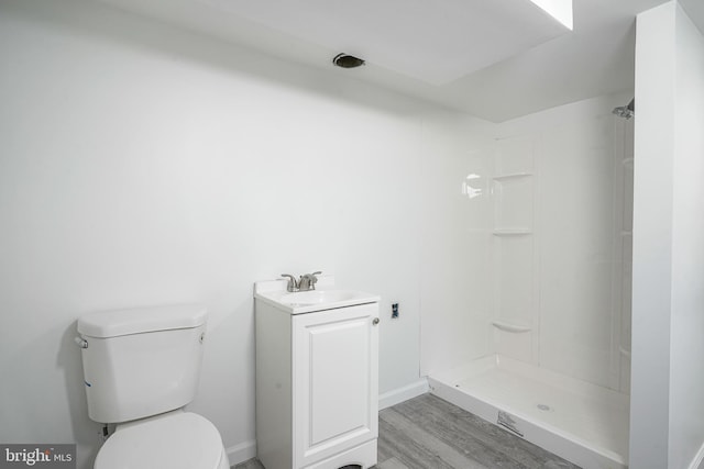 505 University Blvd, Wenonah, NJ 08090 - bathroom with wood finished floors, toilet, a shower, and vanity