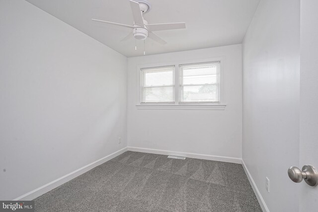 505 University Blvd, Wenonah, NJ 08090 - empty room featuring dark colored carpet, a ceiling fan, and baseboards