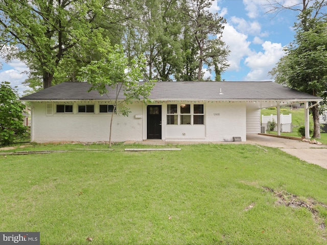 7435 Bath St, Springfield, VA 22150 - ranch-style home with brick siding, driveway, a carport, and a front lawn