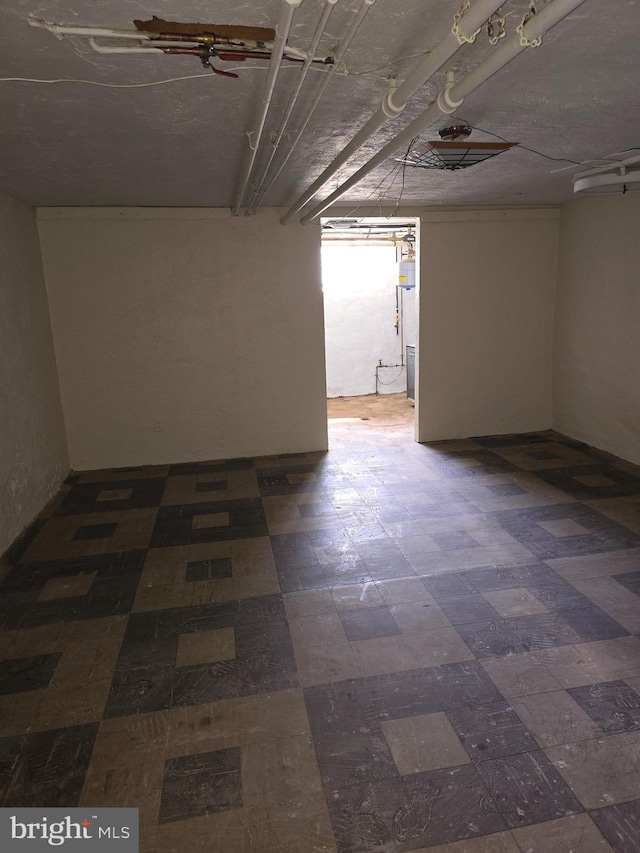basement with tile patterned floors