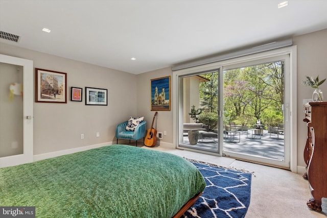 bedroom featuring baseboards, visible vents, carpet flooring, and access to exterior
