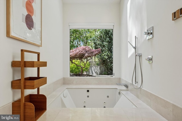 full bath featuring a tub with jets