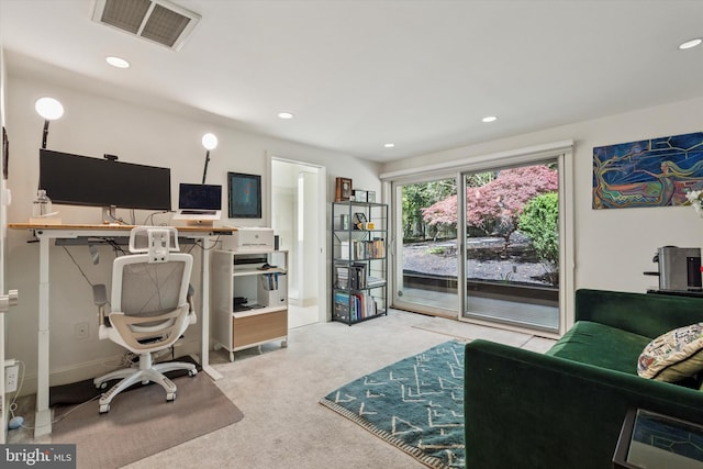 carpeted office space with recessed lighting and visible vents