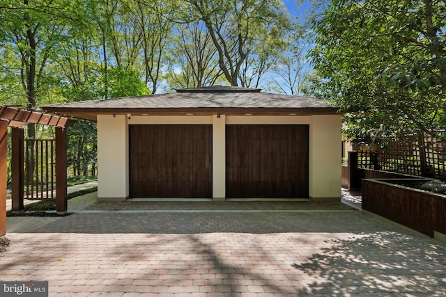 garage featuring driveway