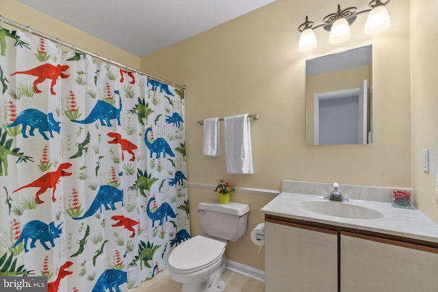 full bathroom with vanity, toilet, baseboards, tile patterned floors, and a shower with shower curtain