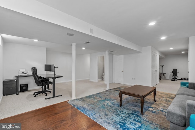 living room featuring an office area, recessed lighting, baseboards, and wood finished floors