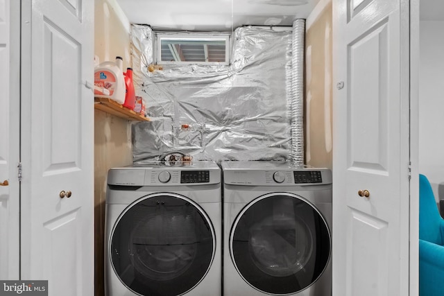 laundry room featuring washing machine and dryer