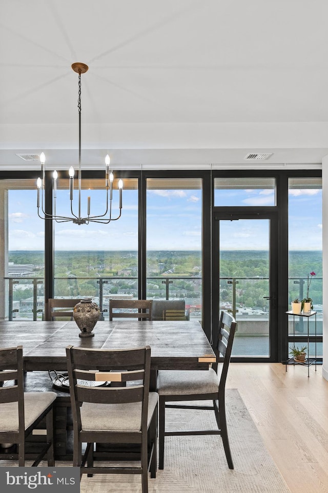 1650 Silver Hill Dr Unit 1706, Mclean, VA 22102 - dining room featuring wood finished floors and a notable chandelier