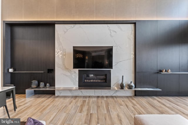 1650 Silver Hill Dr Unit 1706, Mclean, VA 22102 - unfurnished living room featuring a high end fireplace and wood finished floors