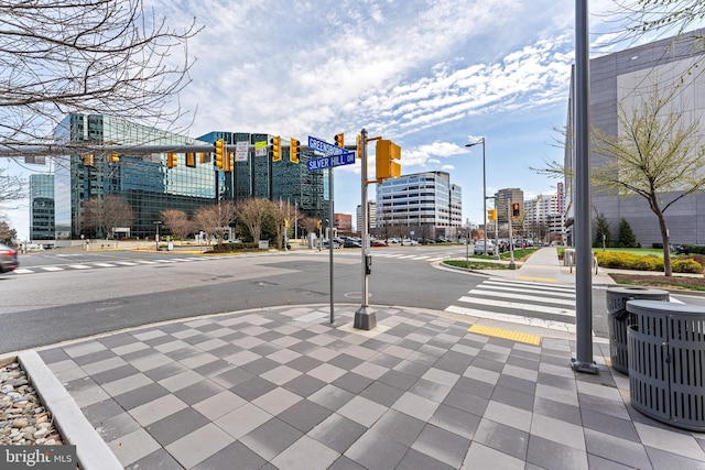 1650 Silver Hill Dr Unit 1706, Mclean, VA 22102 - view of street featuring street lighting, curbs, a view of city, traffic lights, and sidewalks