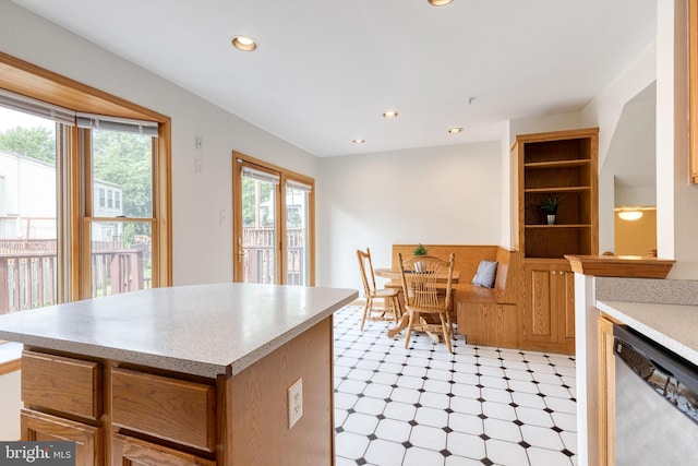7 Silver Birch Ct, Owings Mills, MD 21117 - kitchen with dishwasher, light floors, light countertops, a center island, and recessed lighting