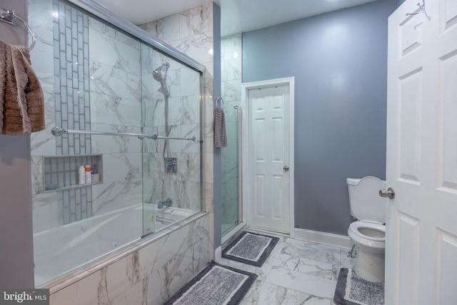 bathroom with baseboards, marble finish floor, tiled shower / bath combo, and toilet
