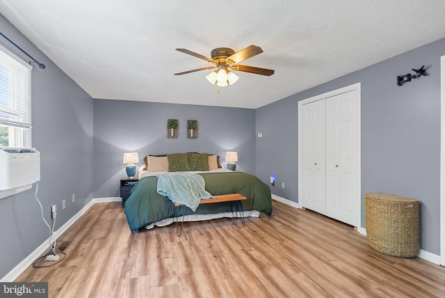 7819 Oak St, Manassas, VA 20111 - bedroom with baseboards, a ceiling fan, a closet, and wood finished floors
