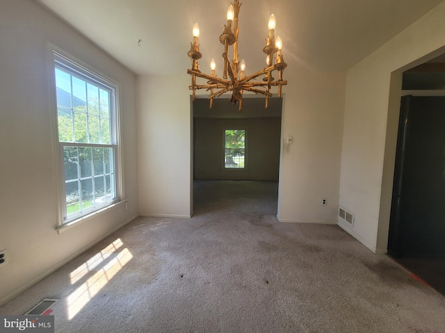 5895 Tibby Rd, Bensalem, PA 19020 - empty room featuring a chandelier, carpet, and baseboards