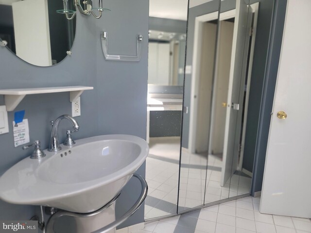 5895 Tibby Rd, Bensalem, PA 19020 - bathroom with a sink and tile patterned flooring