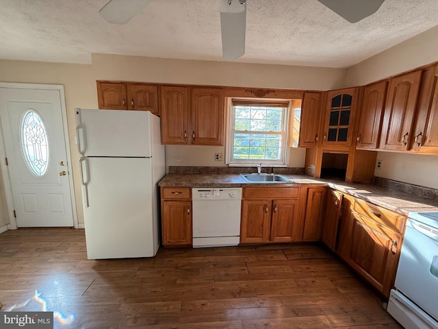 2218 Trenton Ave, Bristol, PA 19007 - kitchen featuring white appliances, ceiling fan, a textured ceiling, brown cabinets, and a sink