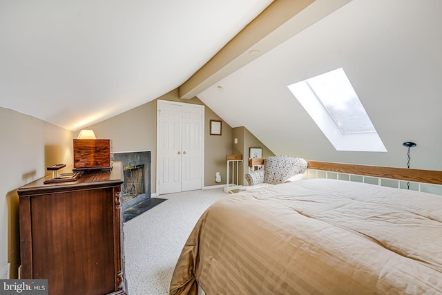 517 Bashford Ln Unit 5, Alexandria, VA 22314 - carpeted bedroom featuring a skylight, a fireplace with flush hearth, and a closet
