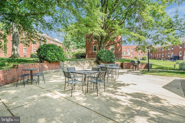 517 Bashford Ln Unit 5, Alexandria, VA 22314 - view of patio featuring outdoor dining space and grilling area